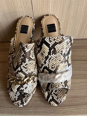 White House Black Market Snake-Print Slide Mules with Gold Chain
